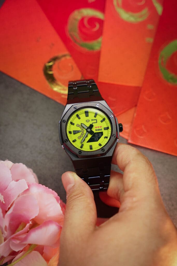 Custom CasiOak GA-2100 Year of the Snake 2025 limited edition watch with retro Nokia Snake game dial and gold yuanbao design